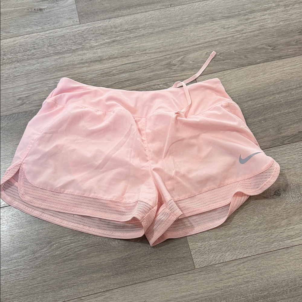 Nike Women’s Light Pink Athletic Shorts with Swoosh